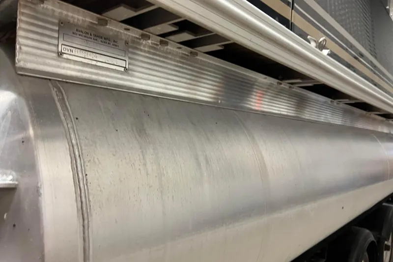 Slide: The Image of 2014 Avalon Grand Island 2485 QF pontoon boat, close-up of aluminum structure. - 75