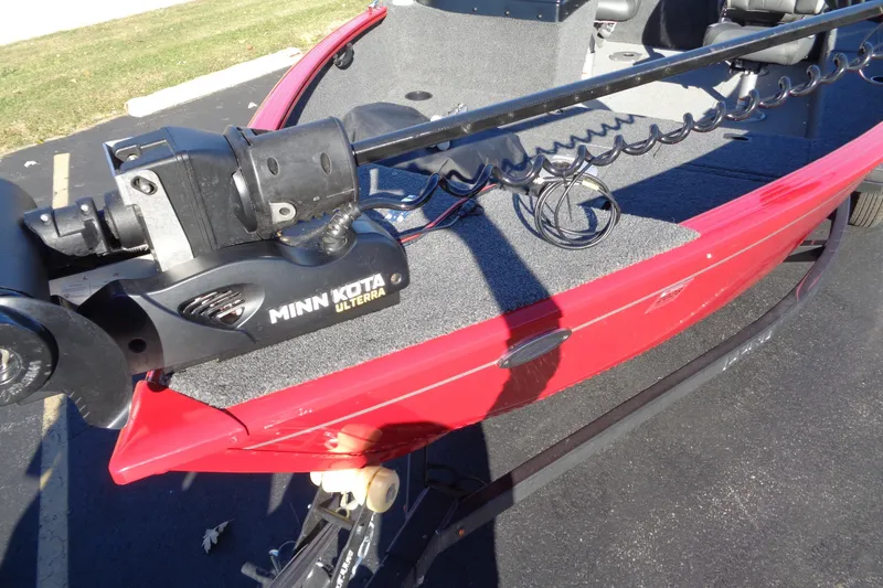 Slide: The Image of Red 2022 Lund 1650 Rebel XL SS boat with Minn Kota Ulterra trolling motor. - 7
