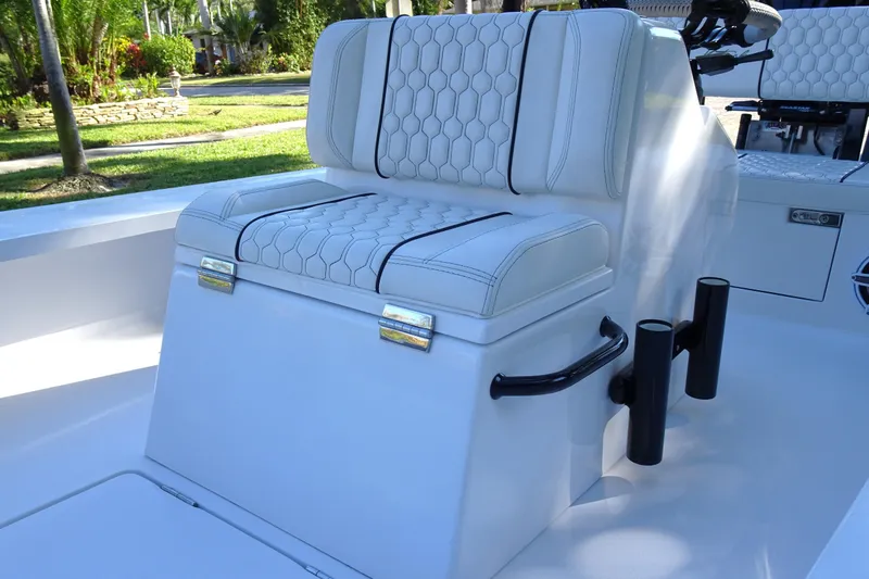 Slide: The Image of Luxurious Vtech 18 boat seating, 2023 model, featuring elegant white upholstery and modern design. - 14