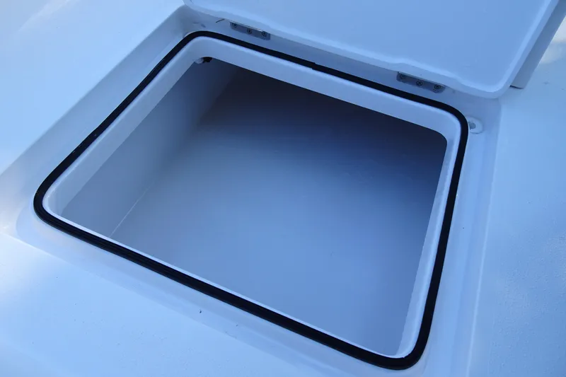 Slide: The Image of Open storage compartment on Vtech 18 model, 2023, with a black seal. - 18