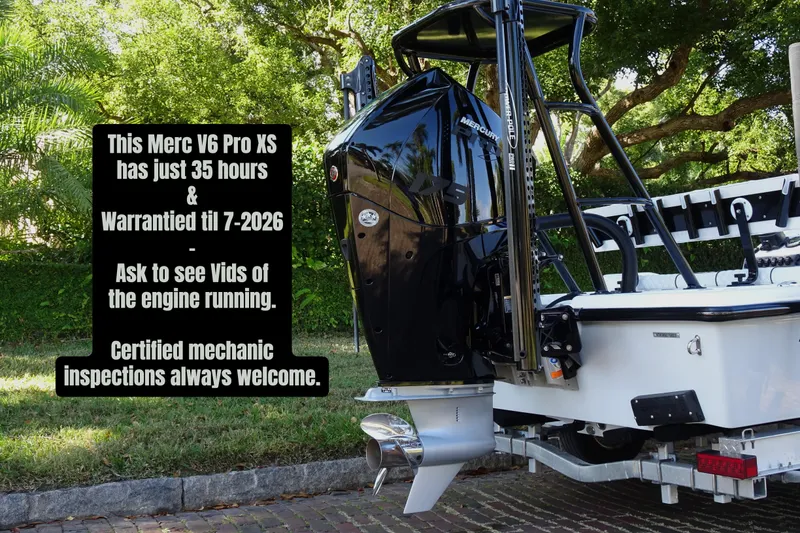 Slide: The Image of Boat with Merc V6 Pro XS engine, 35 hours, warranty until 2026, Vtech model 18, 2023. - 2