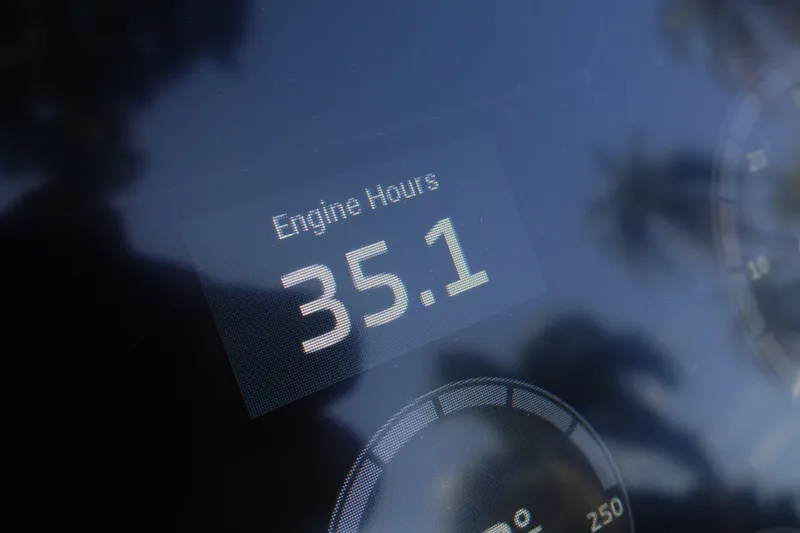 Slide: The Image of Close-up of Vtech 18 engine hours display showing 35.1 hours, 2023 model. - 21