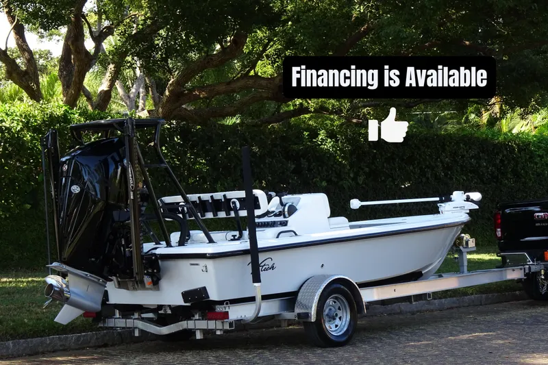 Slide: The Image of 2023 Vtech 18 boat on trailer, financing available, outdoor setting. - 3