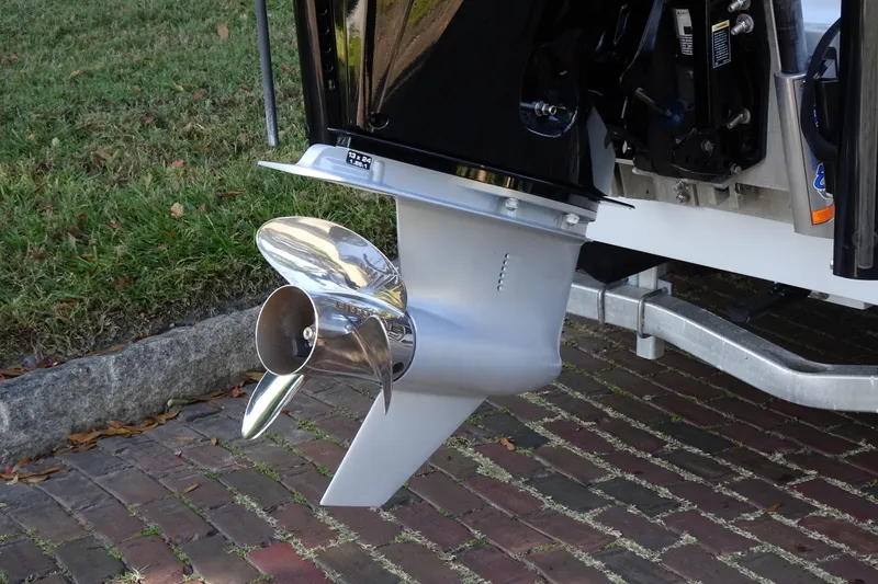 Slide: The Image of Vtech 18 outboard motor propeller, 2023 model, on a boat trailer. - 9