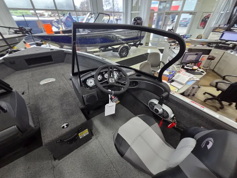 Slide: The Image of Interior view of Crestliner 1750 HAWKWT JS 2026 boat in showroom. - 14