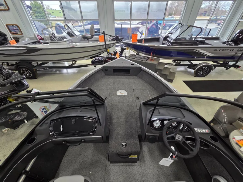 Slide: The Image of Interior view of 2026 Crestliner 1750 HAWKWT JS boat in showroom. - 7