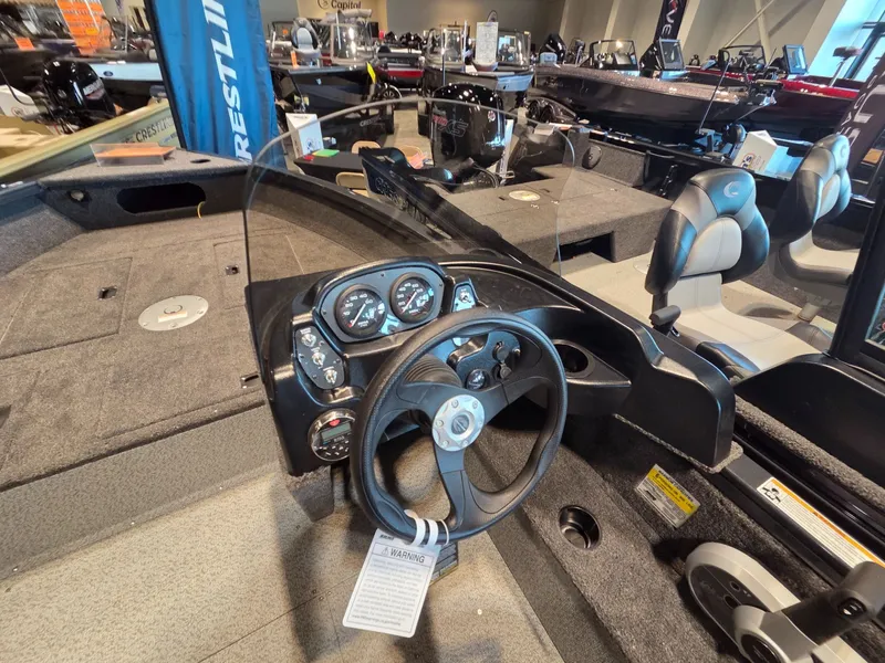 Slide: The Image of Interior view of 2026 Crestliner 1850 Kodiak SC boat. - 10