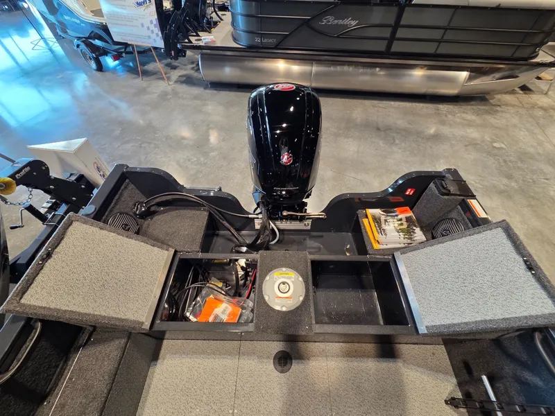 Slide: The Image of Interior view of 2026 Crestliner 1850 Kodiak SC with engine. - 16