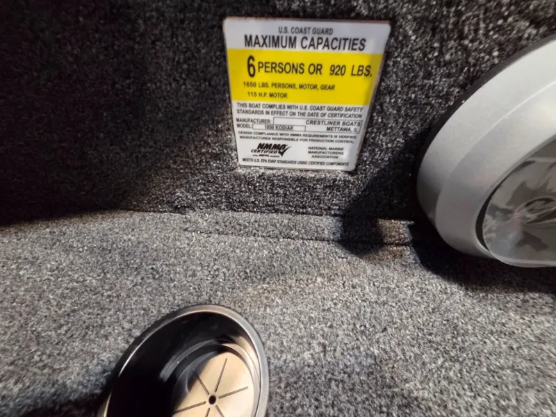 Slide: The Image of 2026 Crestliner 1850 Kodiak SC capacity label, 6 persons or 920 lbs. - 19