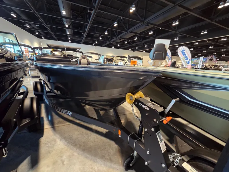 Slide: The Image of 2026 Crestliner 1850 Kodiak SC boat in showroom. - 4