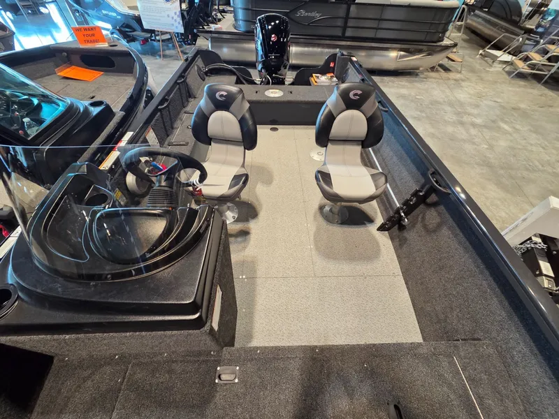 Slide: The Image of Interior of Crestliner 1850 Kodiak SC boat, model year 2026. - 9