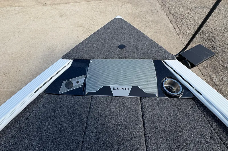 Slide: The Image of 2026 Lund 1875 Pro-V Bass XS boat deck with sleek design and modern features. - 15