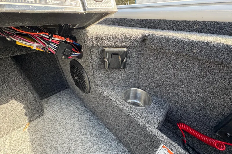 Slide: The Image of Interior of 2026 Lund 1875 Pro-V Bass XS boat with speaker and wiring. - 22