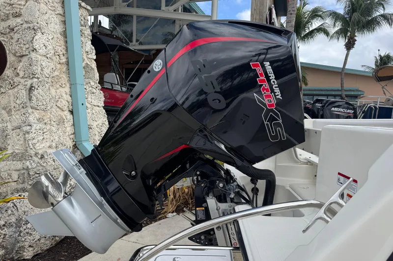 Slide: The Image of 2024 Mako 214 Center Console with Mercury Pro XS outboard motor. - 3