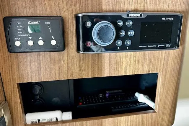 Slide: The Image of Control panel on 2016 Boston Whaler 285 Conquest boat with Fusion audio system. - 18