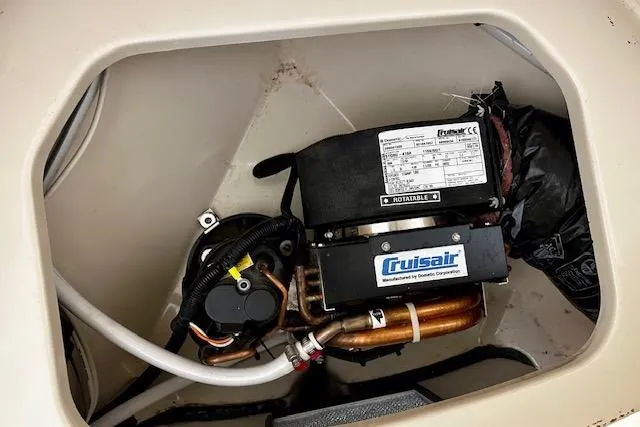 Slide: The Image of Cruisair system in 2016 Boston Whaler 285 Conquest boat compartment. - 20