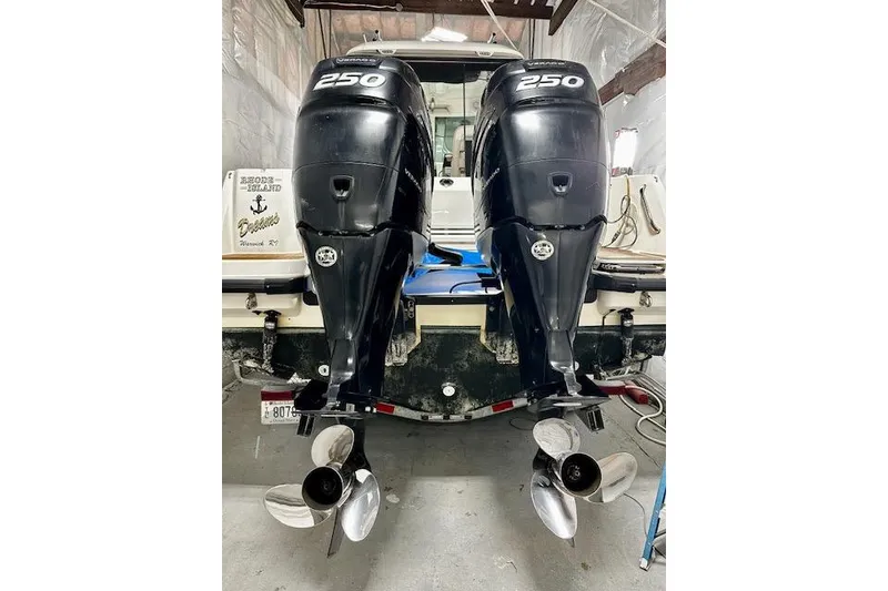 Slide: The Image of 2016 Boston Whaler 285 Conquest with twin 250 horsepower outboard engines. - 32