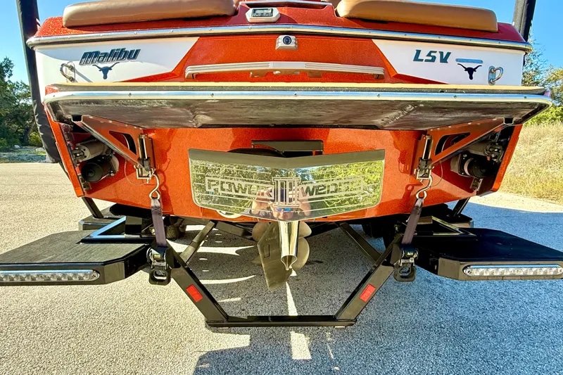 Slide: The Image of 2019 Malibu Wakesetter 23 LSV rear view with Power Wedge feature. - 23