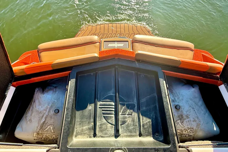 Slide: The Image of 2019 Malibu Wakesetter 23 LSV boat interior with ballast bags and swim platform. - 33