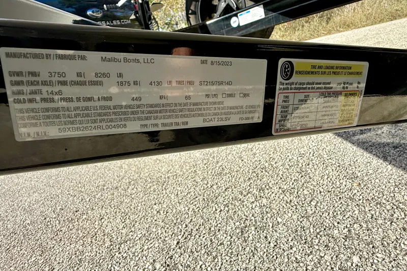 Slide: The Image of Label on 2019 Malibu Wakesetter 23 LSV trailer with specifications and tire information. - 65