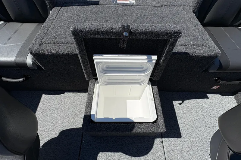 Slide: The Image of 2026 Lund 1875 Renegade boat interior with open storage compartment. - 19