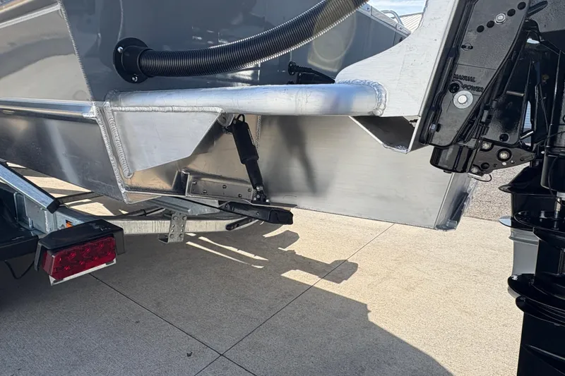 Slide: The Image of 2026 Lund 210 Heavy Gauge boat trailer hitch and rear detail. - 13