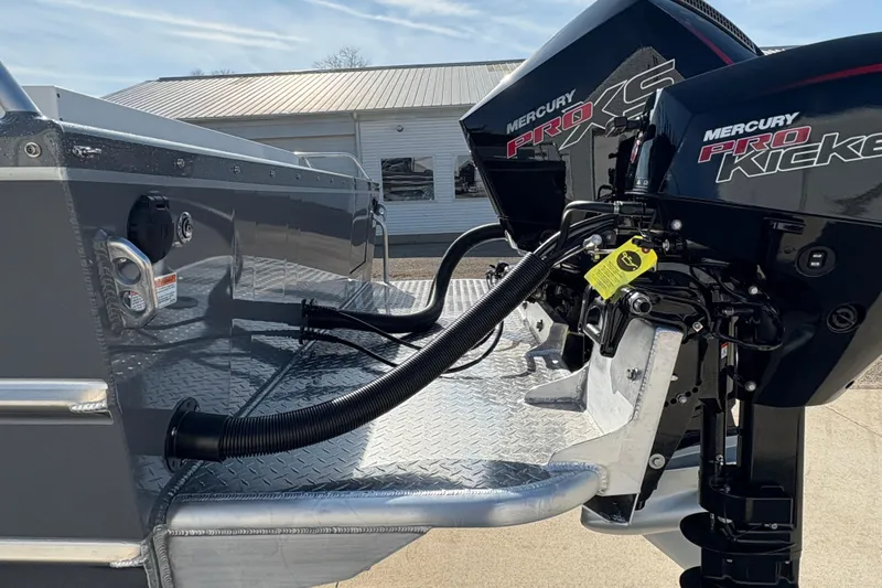 Slide: The Image of 2026 Lund 210 Heavy Gauge boat with dual Mercury Pro XS and Pro Kicker engines. - 14