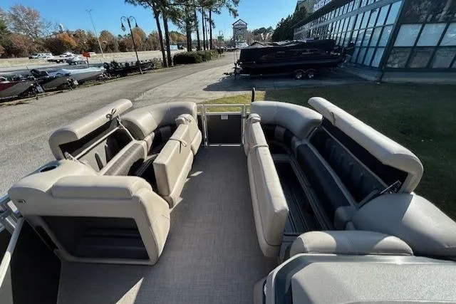 Slide: The Image of 2025 Sun Tracker Party Barge 20 DLX pontoon boat with spacious seating and modern design. - 6
