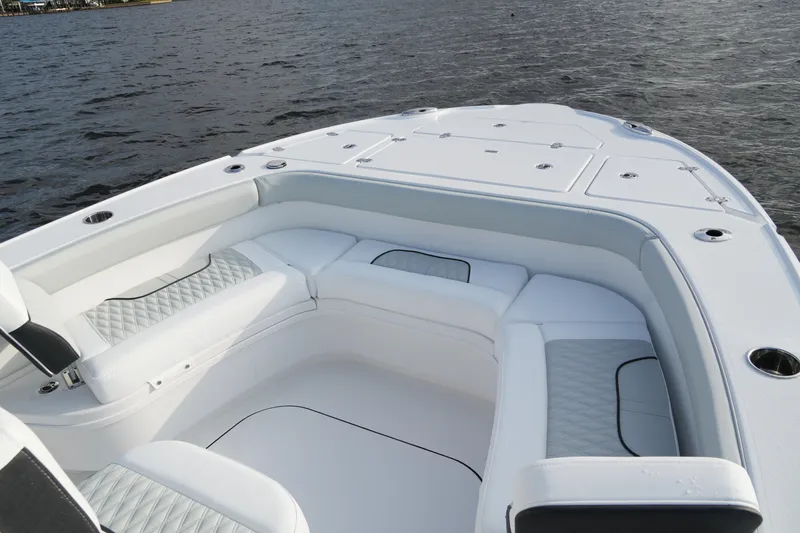 Slide: The Image of Luxurious seating on 2026 Blackfin 262 HB boat, overlooking serene water. - 41