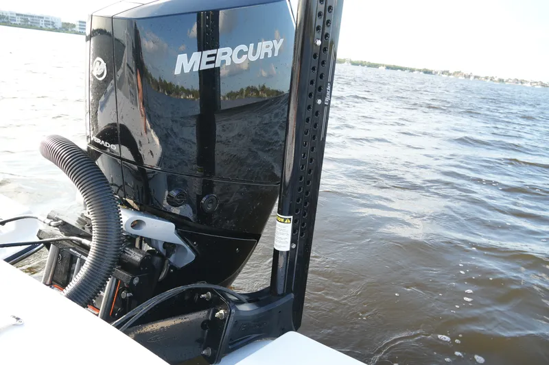 Slide: The Image of 2026 Blackfin 262 HB boat with Mercury engine on water. - 53