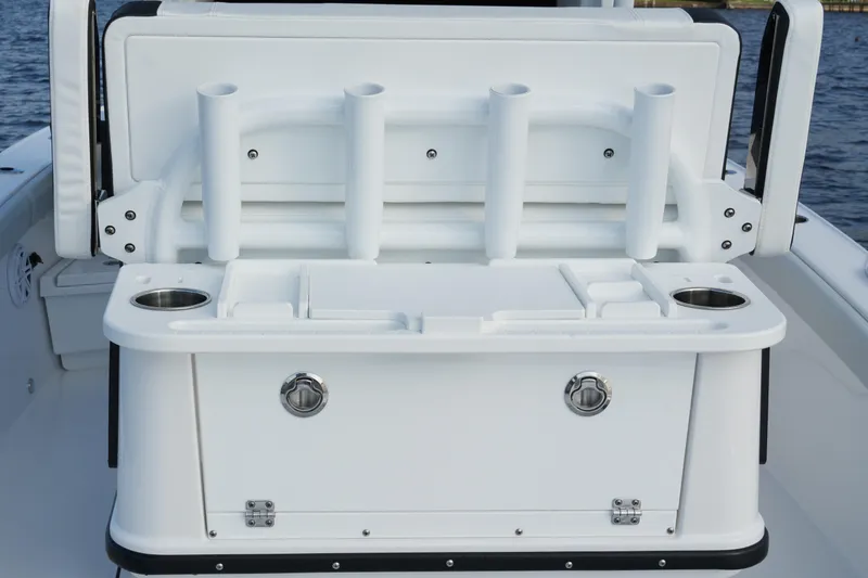 Slide: The Image of 2026 Blackfin 262 HB boat with rod holders and storage compartments. - 59