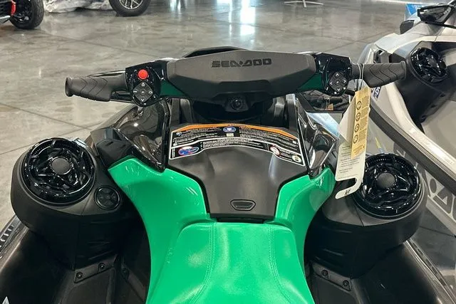 Slide: The Image of 2026 Sea-Doo GTI jet ski with green seat and black handlebars. - 14