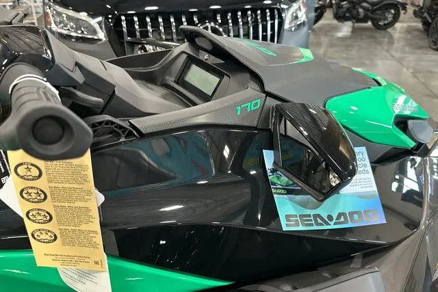 Slide: The Image of 2026 Sea-Doo GTI jet ski in green and black design. - 26