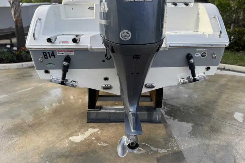 Slide: The Image of Rear view of a 2019 Sea Hunt Ultra 235 SE boat with Yamaha outboard motor. - 10