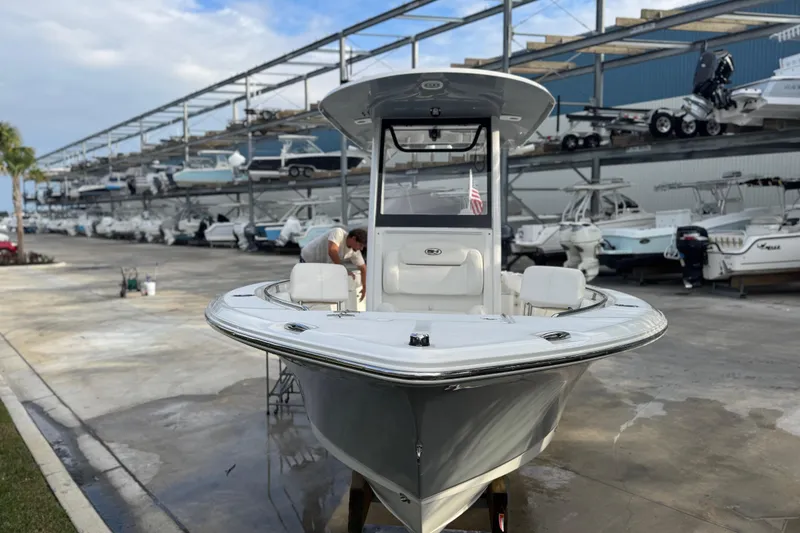 The Image of 2019 Sea Hunt Ultra 235 SE boat in marina storage, front view. - 8
