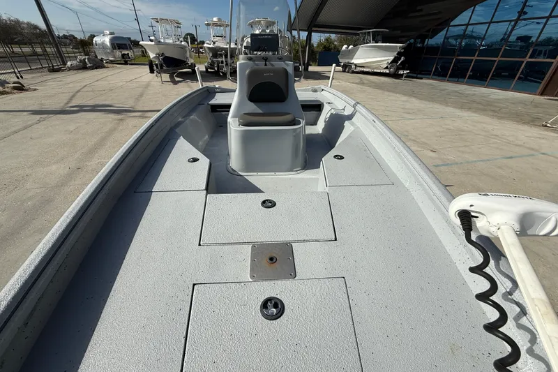 Slide: The Image of 2018 Excel 203 Bay Pro boat with spacious deck and modern design. - 11