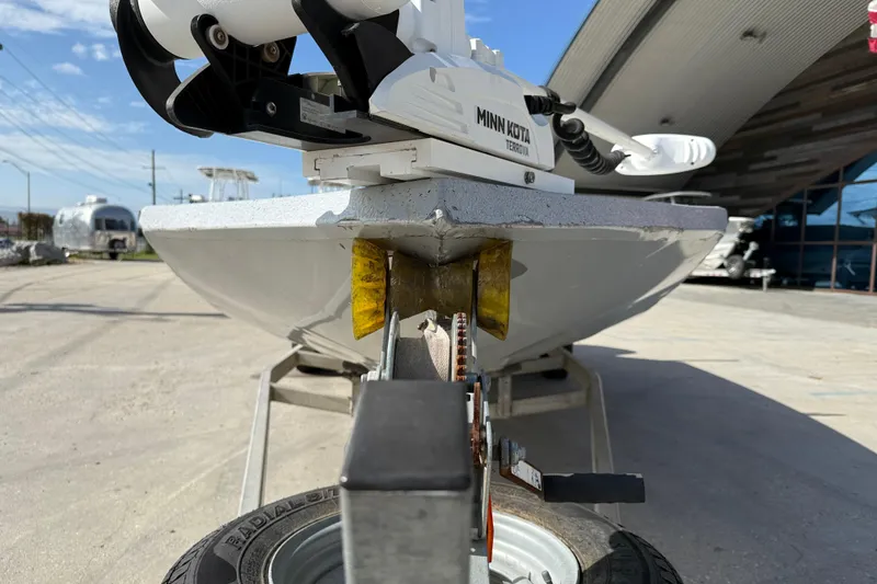 Slide: The Image of 2018 Excel 203 Bay Pro boat on trailer with Minn Kota motor. - 3