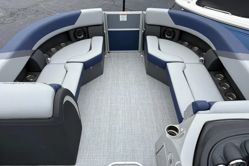 Slide: The Image of Luxurious interior of 2026 South Bay S 224 pontoon boat with plush seating and cup holders. - 5
