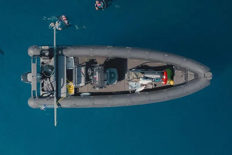 Slide: The Image of Manufacturer Provided Image: Aerial view of 2025 Highfield Patrol 860 boat on blue water. - 3