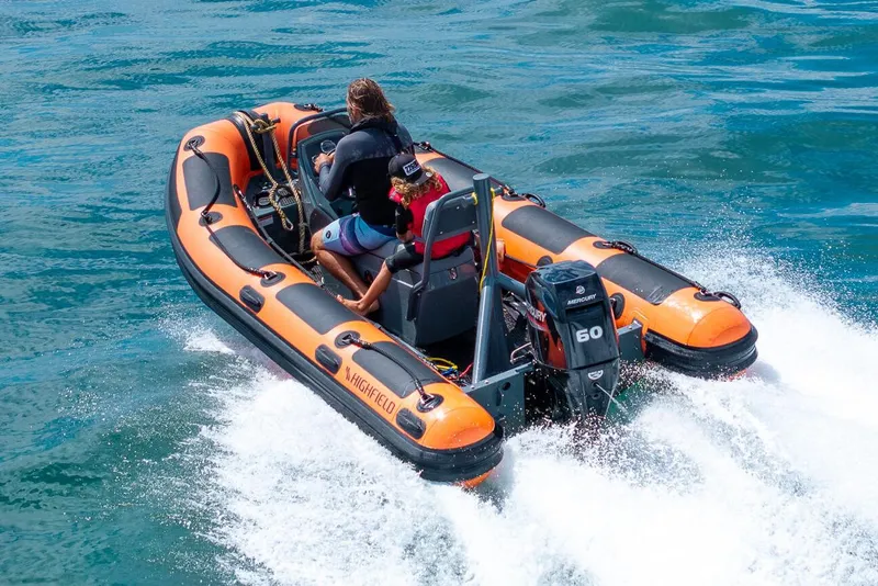 The Image of Manufacturer Provided Image: 2025 Highfield Patrol 420 inflatable boat speeding on water. - 0