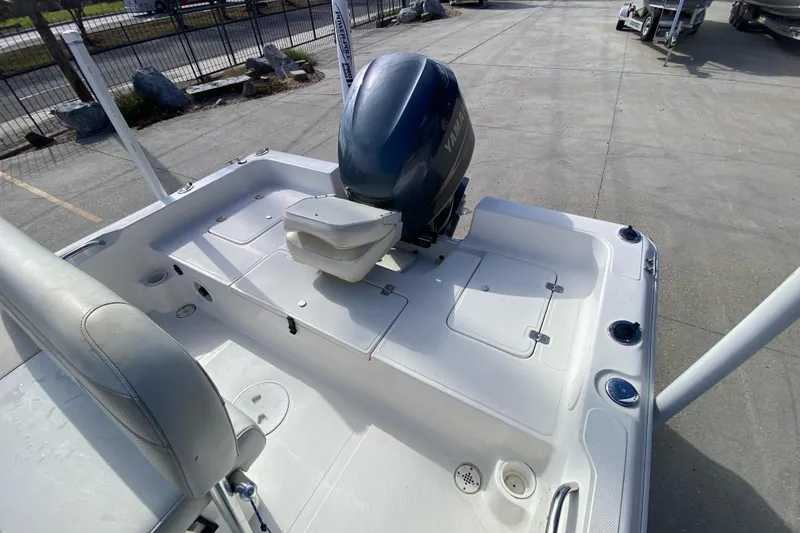Slide: The Image of 2006 Sea Quest 2100 Probay boat with Yamaha outboard motor, docked on concrete. - 14