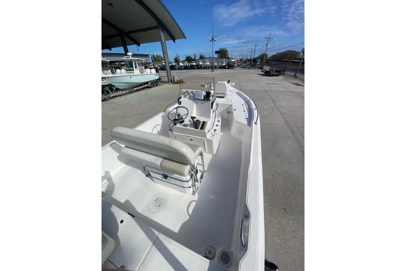Slide: The Image of 2006 Sea Quest 2100 Probay boat interior with steering console and seating. - 16