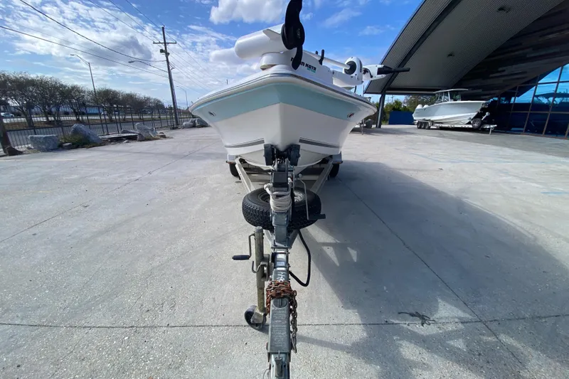 Slide: The Image of 2006 Sea Quest 2100 Probay boat on trailer in outdoor lot. - 8