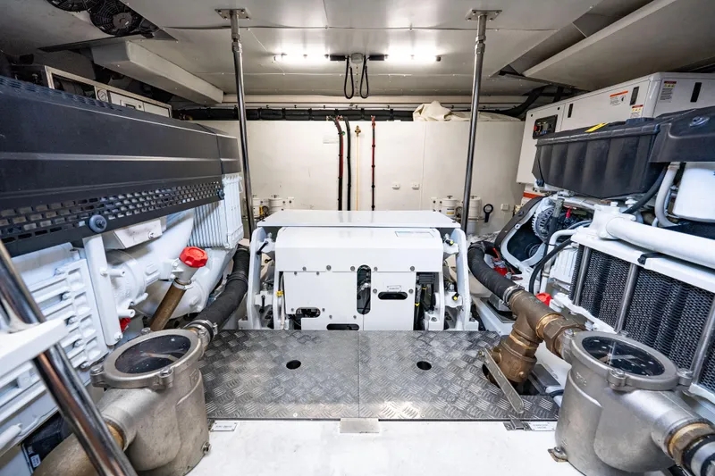 Slide: The Image of Engine room of 2024 Azimut Fly 68 yacht, showcasing advanced machinery and equipment. - 13