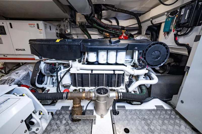 Slide: The Image of Engine room of 2024 Azimut Fly 68 yacht, featuring advanced machinery and components. - 14