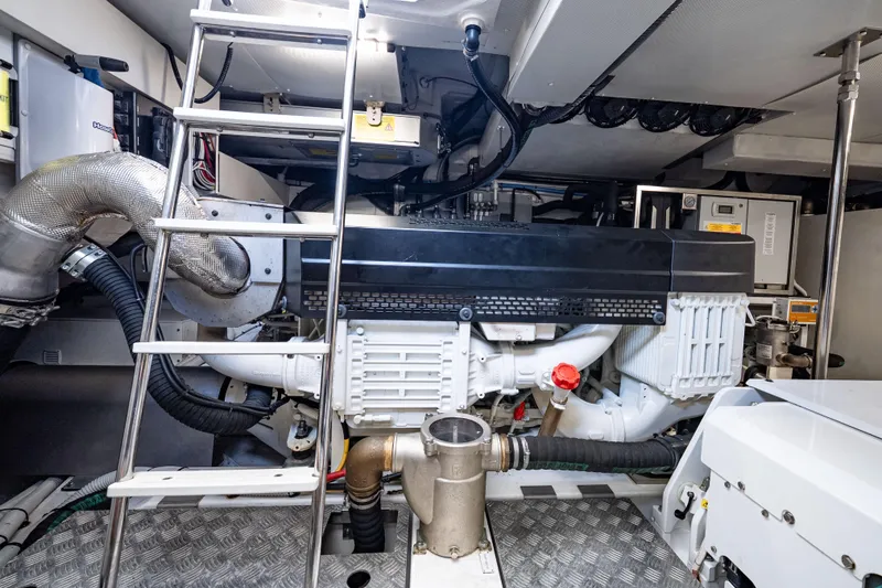 Slide: The Image of Engine room of 2024 Azimut Fly 68 yacht, featuring advanced machinery and equipment. - 15