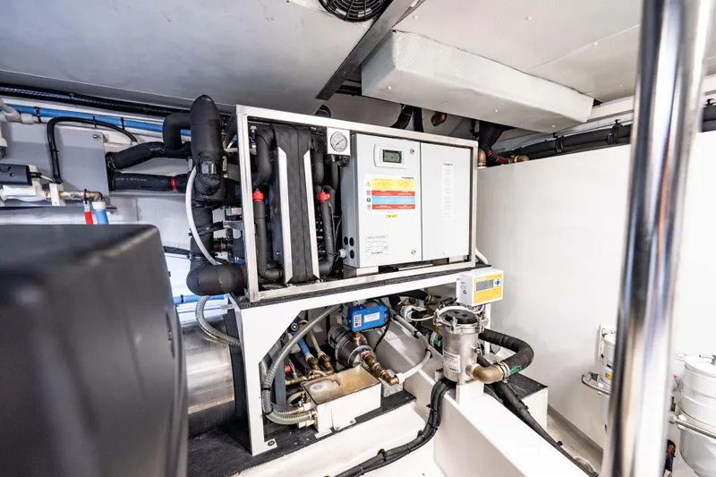Slide: The Image of Engine room of 2024 Azimut Fly 68 yacht, showcasing advanced machinery and systems. - 16