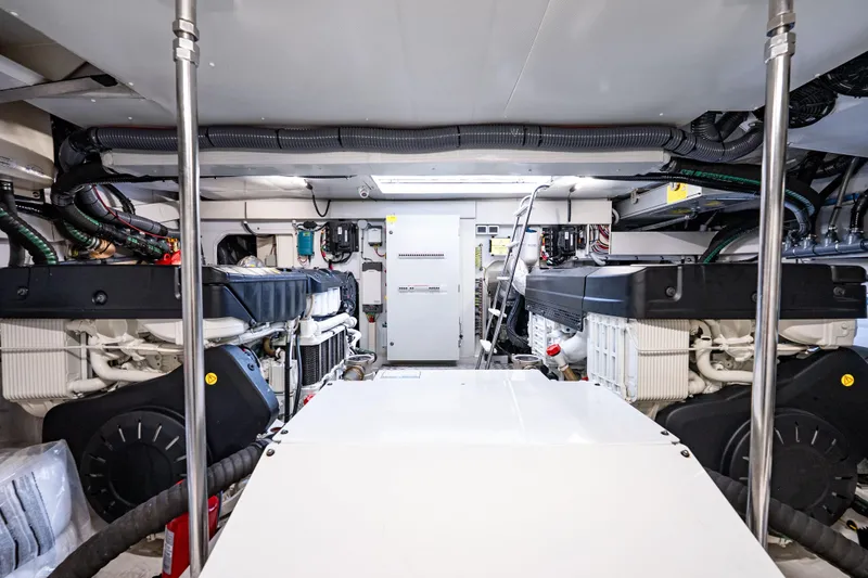 Slide: The Image of Engine room of 2024 Azimut Fly 68 yacht, showcasing advanced machinery and equipment. - 18