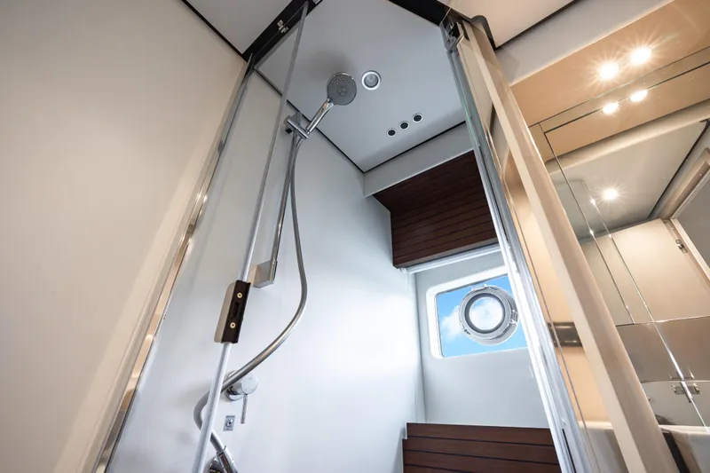 Slide: The Image of Luxurious shower in 2024 Azimut Fly 68 yacht, featuring modern fixtures and elegant design. - 23