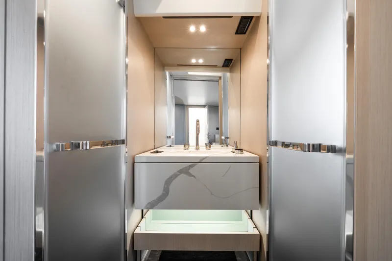 Slide: The Image of Luxurious bathroom interior of 2024 Azimut Fly 68 yacht, featuring modern design and elegant fixtures. - 26